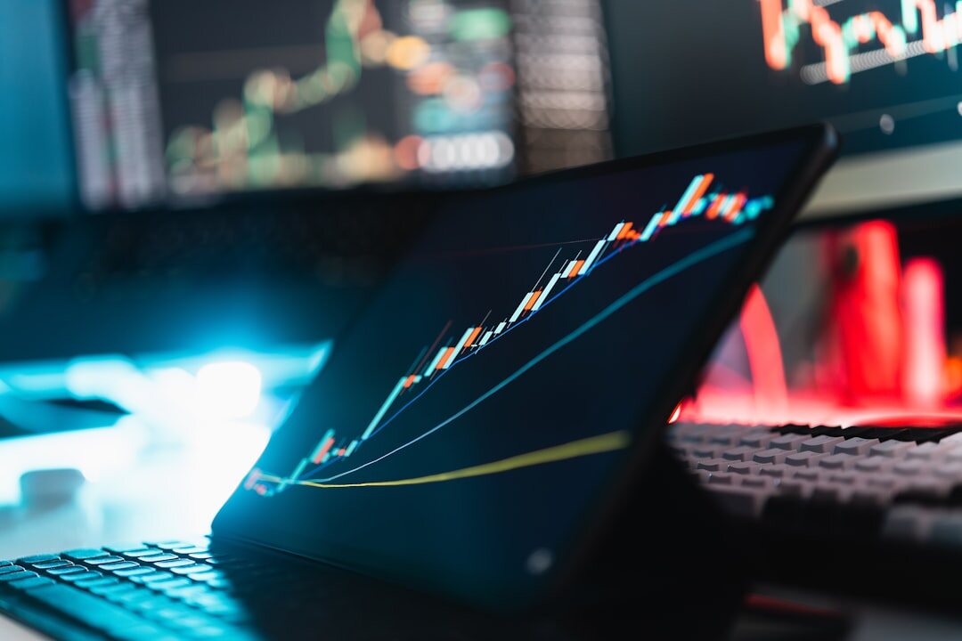Digital data analytics dashboard with charts and graphs on screen